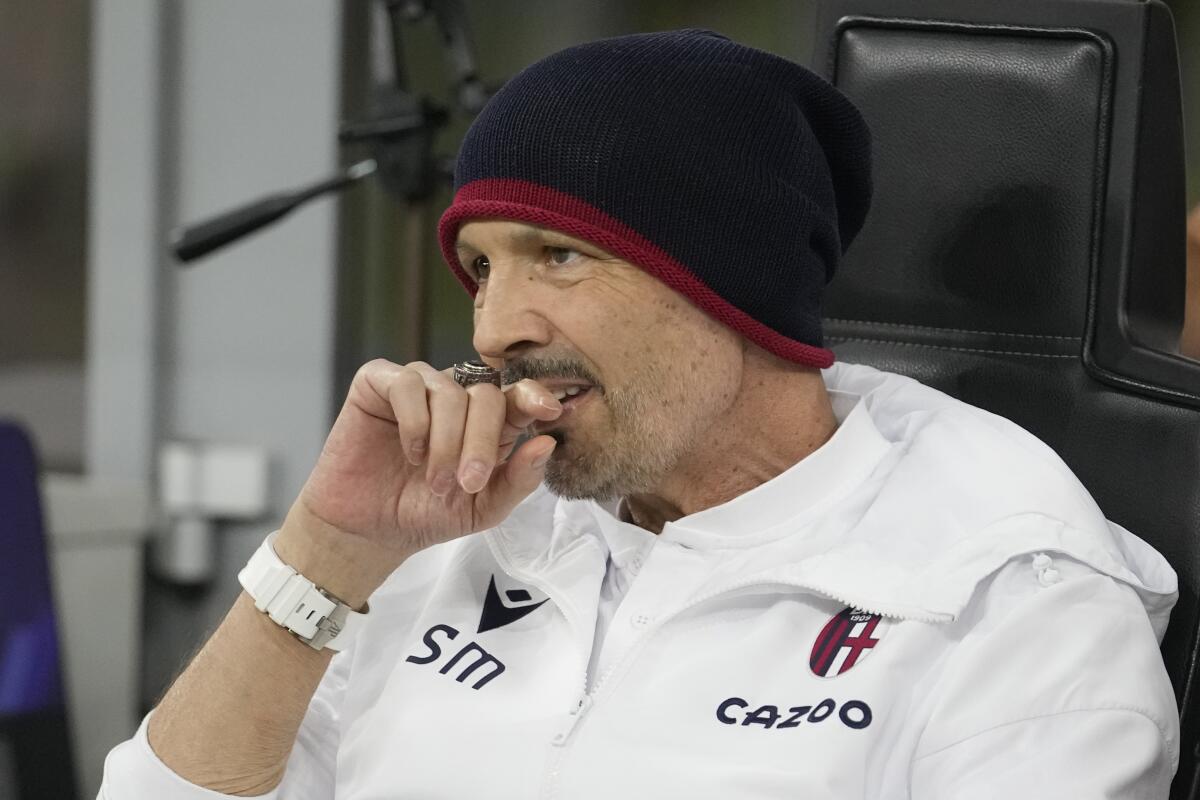Bologna's head coach Sinisa Mihajlovic gestures as he attends a Serie A soccer match between AC Milan and Bologna at the San Siro stadium in Milan, Italy, Saturday, Aug. 27, 2022. (AP Photo/Luca Bruno)