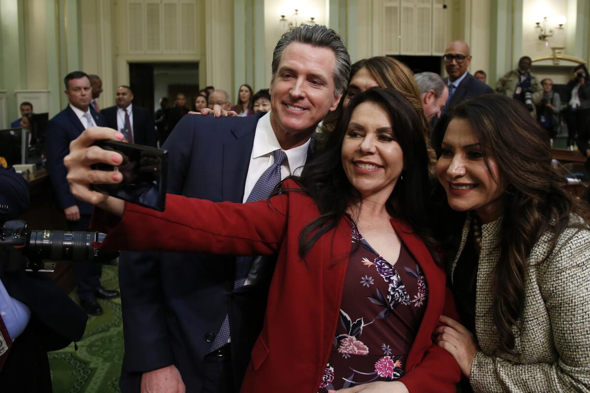 Gov. Gavin Newsom with Assemblywoman Blanca Rubio and Sen. Susan Rubio