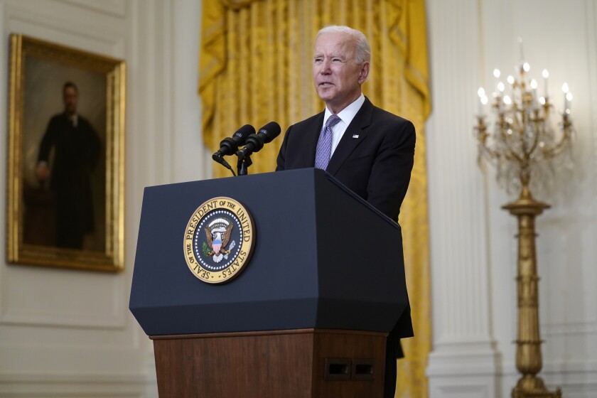 FILE President Joe Biden speaks about distribution of COVID-19 vaccines, in the East Room of the White House, Monday, May 17, 2021, in Washington. The Biden administration announced Tuesday, May 18 it would repeal the changes made by the Trump administration to an important law made to stop banks from discriminating against racial minorities and the poor. (AP Photo/Evan Vucci)