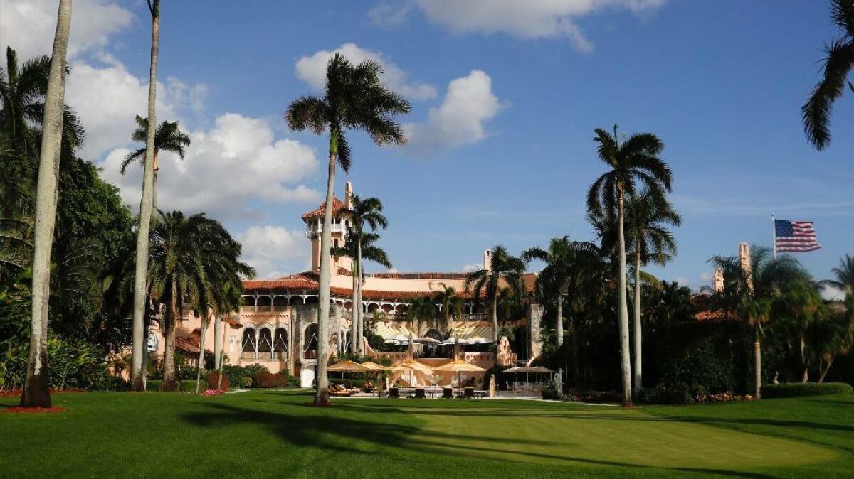 In this Nov. 27, 2016, file photo, Mar-a-Lago is seen from the media van window in Palm Beach, Fla.