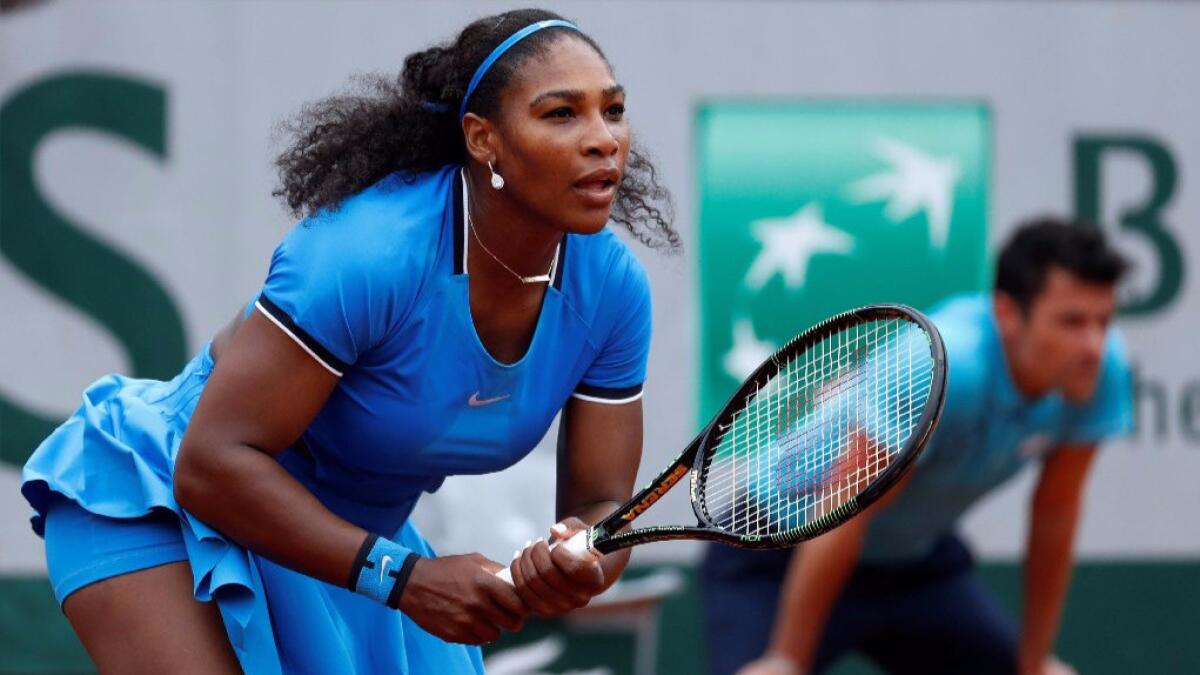Serena Williams waits to return a serve back to Teliana Pereira of Brazil during their second round match at the French Open on May 26.