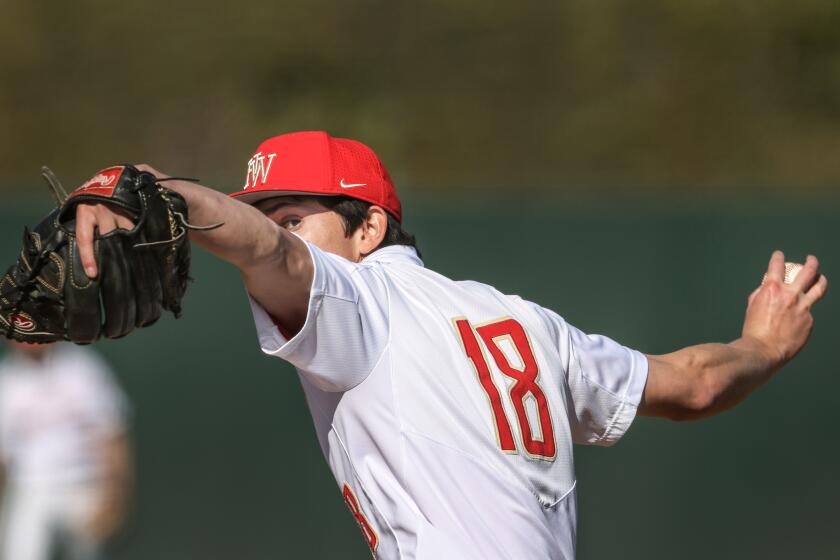 Encino, CA, Tuesday, March 23, 2021 - Harvard Westlake pitcher Christian Becerra delivers a pitch early in the game against JSerra Catholic at O'Malley Family Field. (Robert Gauthier/Los Angeles Times)