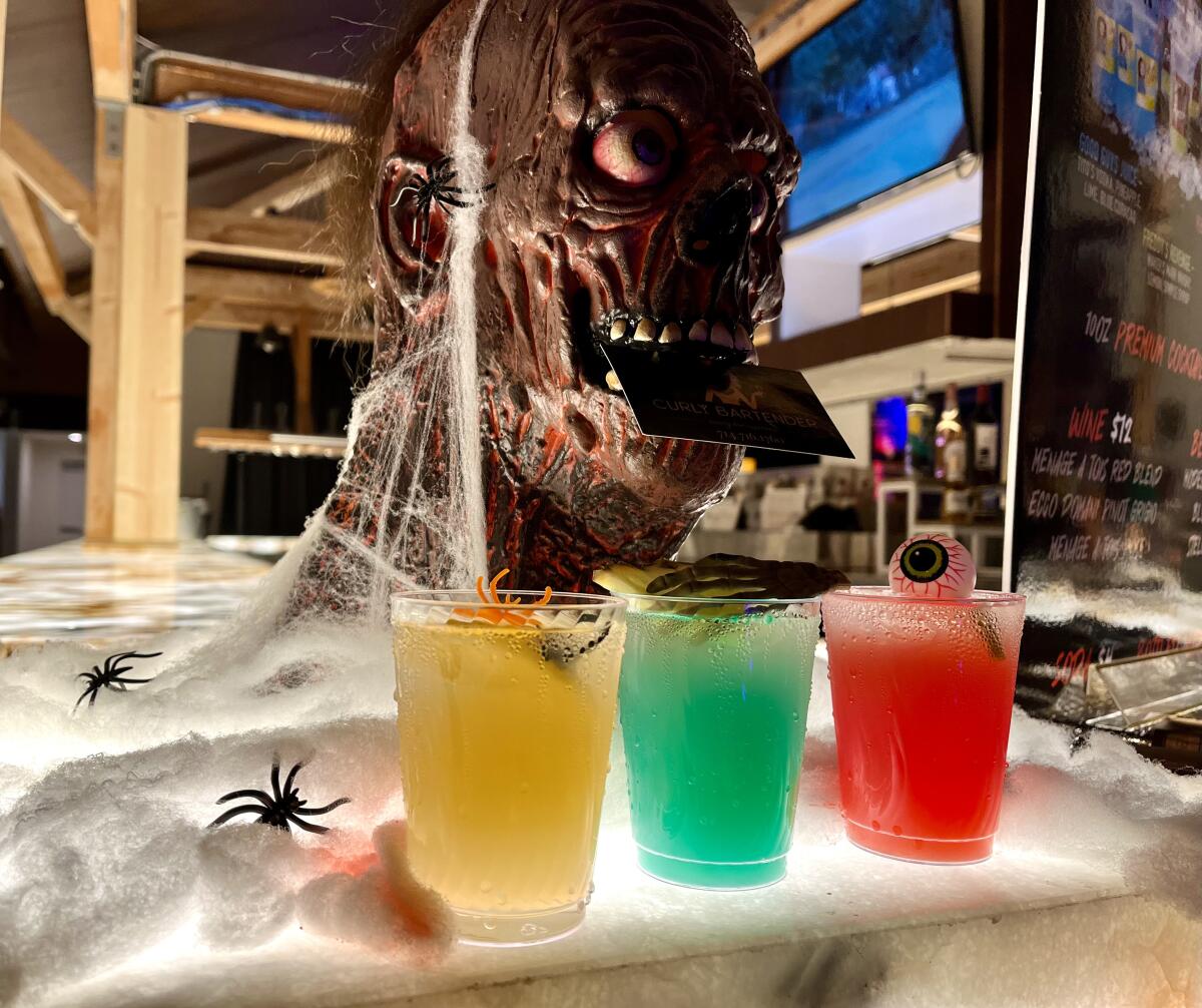 specialty cocktails Freddy's Revenge, Good Guys Juice and Pennywise Surprise