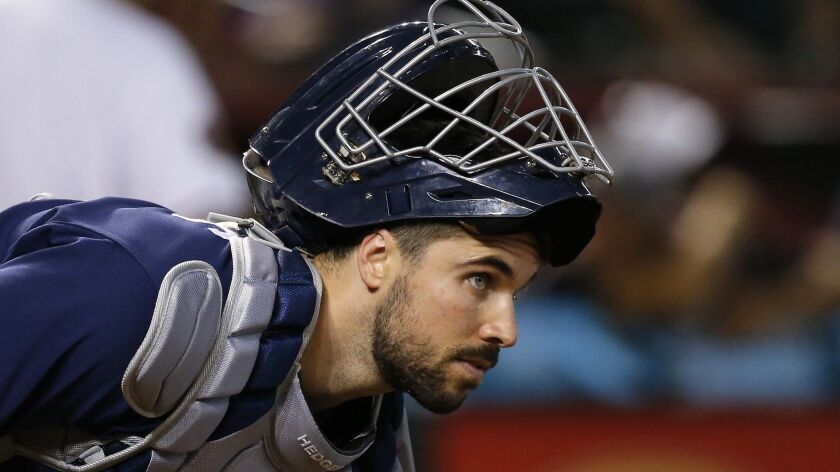 Austin Hedges pauses at home plate during the first inning of Thursday game against the Arizona Diamondbacks.