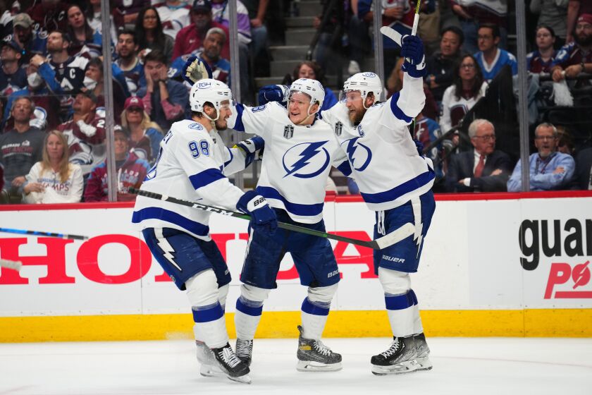 Tampa Bay's Ondrej Palat, middle, celebrates his goal with Mikhail Sergachev, left, and Steven Stamkos on June 24, 2022.