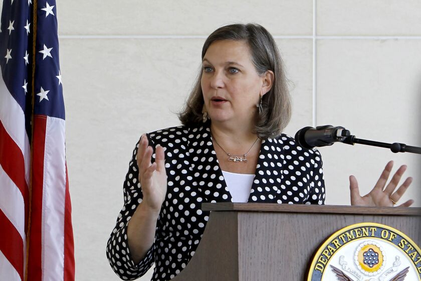 FILE - In this July 11, 2016, file photo U.S. Assistant Secretary of State for European and Eurasian Affairs Victoria Nuland talks to the media at a news conference at the U.S. Embassy in Skopje, Macedonia. The United States and Germany have reached a deal that will allow the completion of a controversial Russian gas pipeline to Europe without the imposition of further U.S. sanctions, a senior U.S. official said Wednesday, July 21, 2021. Under Secretary of State for Political Affairs Victoria Nuland told Congress that the two governments would shortly announce details of the pact that is intended to address U.S. and eastern and central European concerns about the impact of the Nord Stream 2 project. (AP Photo/Boris Grdanoski, File)