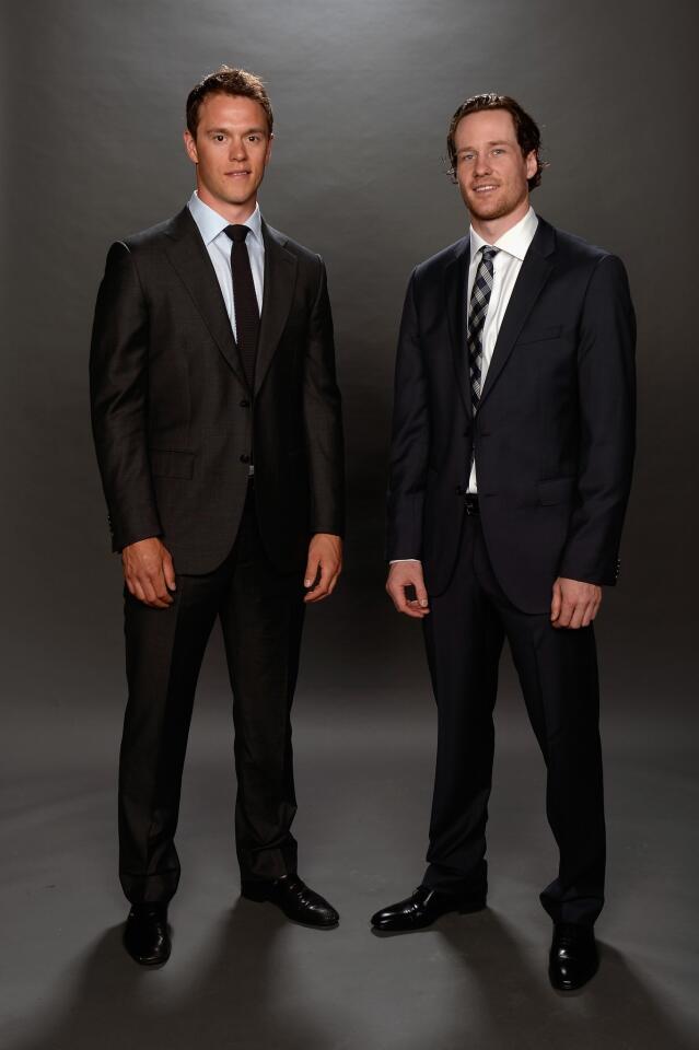 Jonathan Toews and Duncan Keith pose for a portrait during the 2014 NHL Awards at Encore Las Vegas.