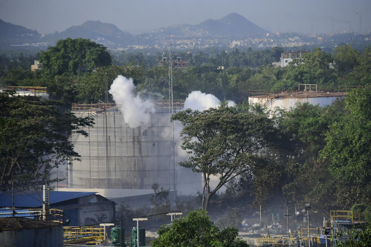 Smoke rises from the LG Polymers plant, the site of a chemical gas leakage, in Vishakhapatnam, India, on May 7, 2020.