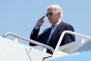 President Joe Biden salutes as he boards Air Force One at Andrews Air Force Base, Md., en route to a campaign trip in Madison, Wis., Friday, July 5, 2024. (AP Photo/Manuel Balce Ceneta)