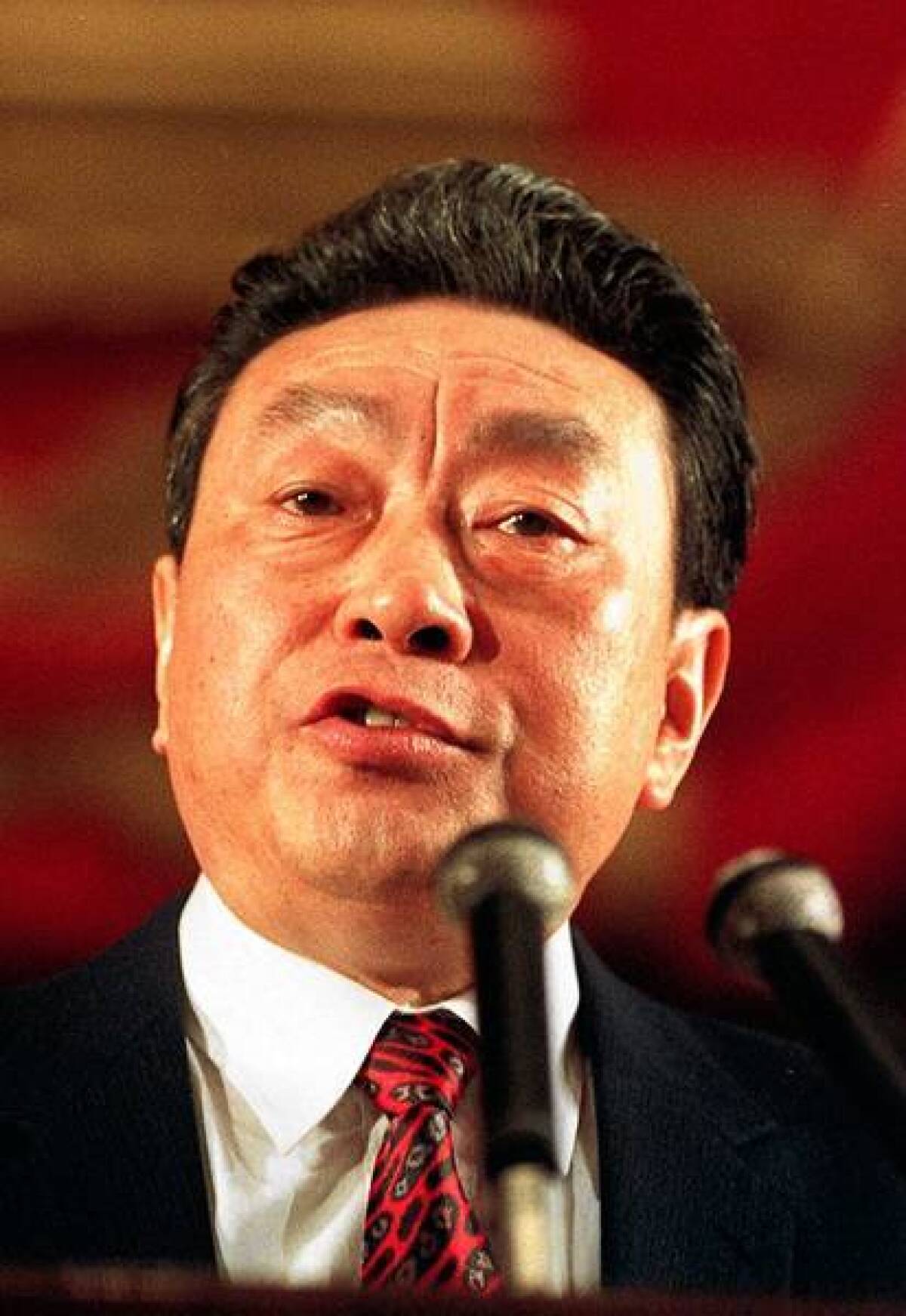 Chen Xitong, former Beijing Communist Party secretary and mayor of Beijing, gives a speech at Beijing's Great Hall of the People in 1993. He was later sentenced to 16 years in prison in a corruption scandal.