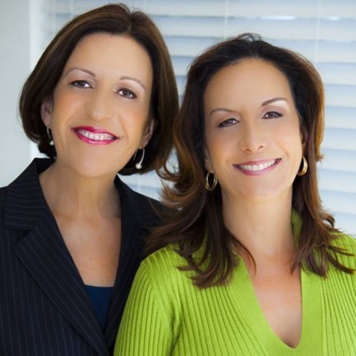 La Jolla real estate agents Susana Corrigan (left) and Patty Cohen.