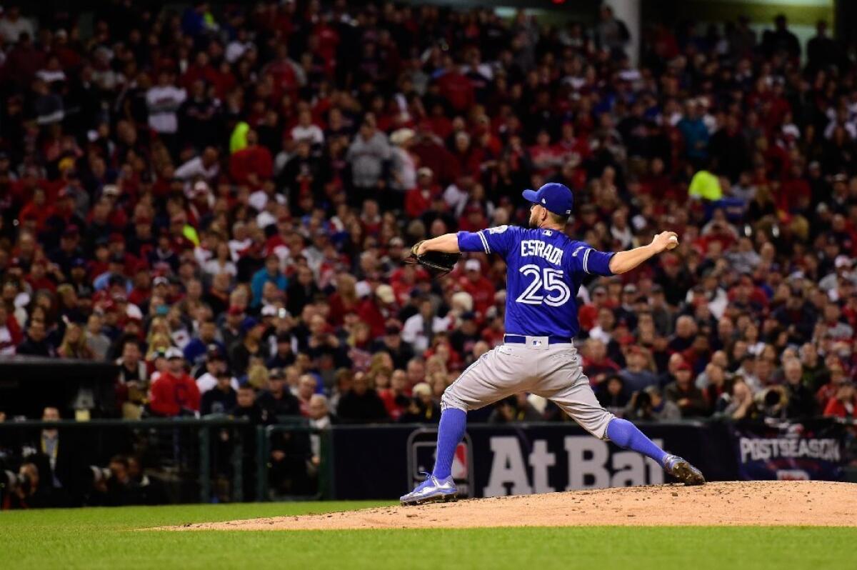 Toronto Blue Jays pitcher Marco Estrada, formerly of Glendale Community College, took the hard-luck loss in Friday's American League Championship Series' first game.