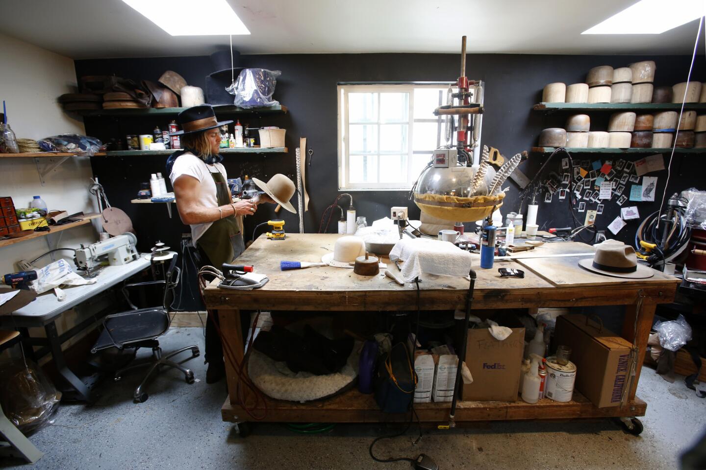 Nick Fouquet, who is also a model, handcrafts one-of-a-kind hats in his Venice studio. His creations have become popular among celebrities such as Madonna and Pharrell Williams.
