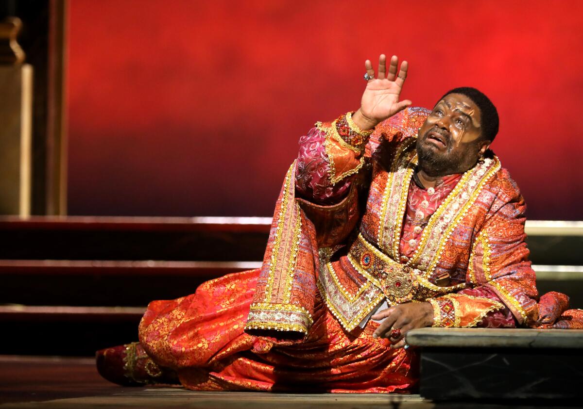 A man performs as the lead character in an opera