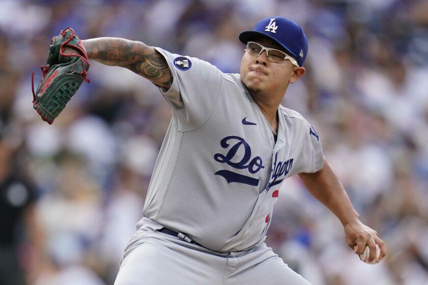 Los Angeles Dodgers starting pitcher Julio Urias works against a San Diego Padres.