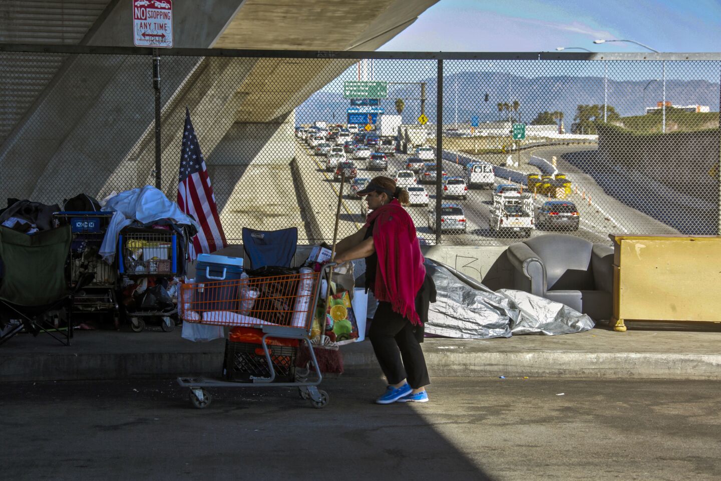 With an estimated 26,000 people calling Los Angeles sidewalks, cars and storm drains home, city officials on Tuesday approved an expanded campaign to help the homeless this winter by opening public buildings as temporary shelters and allowing people to sleep inside vehicles in designated lots.
