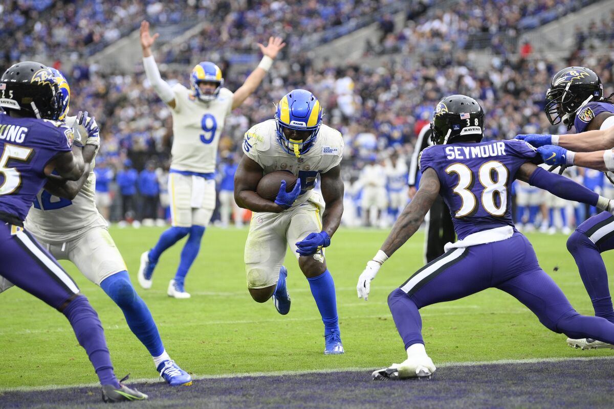 Sony Michel runs for a touchdown against the Baltimore Ravens on Jan. 2.