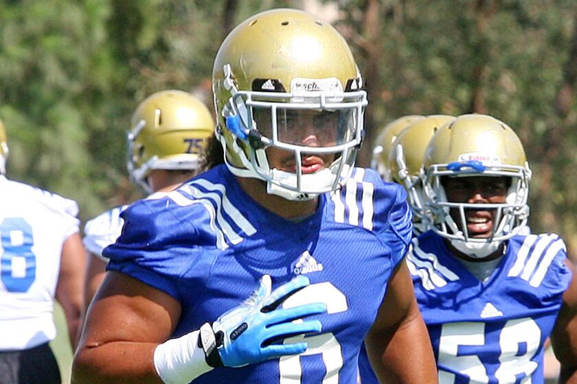 UCLA linebacker Eric Kendricks takes part in a team practice session last summer.