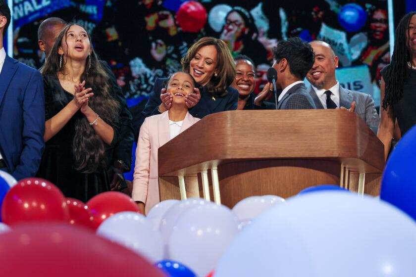 Vice President Kamala Harris on stage with family at the Democratic National Convention