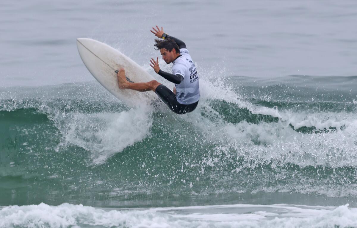Adur Amatriain surfs to first in his heat during the round of 80 at the U.S. Open of Surfing on Thursday.