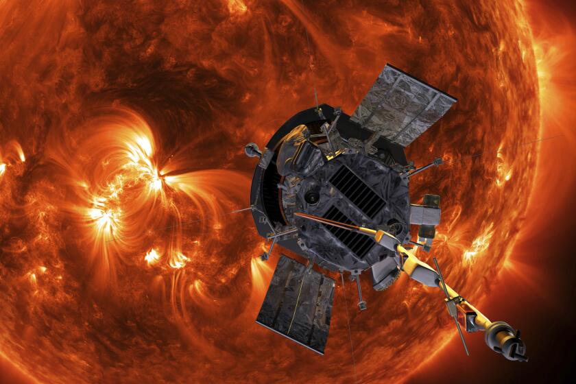 This image made available by NASA shows an artist's rendering of the Parker Solar Probe approaching the Sun. It's designed to take solar punishment like never before, thanks to its revolutionary heat shield thatâs capable of withstanding 2,500 degrees Fahrenheit (1,370 degrees Celsius). (Steve Gribben/Johns Hopkins APL/NASA via AP)