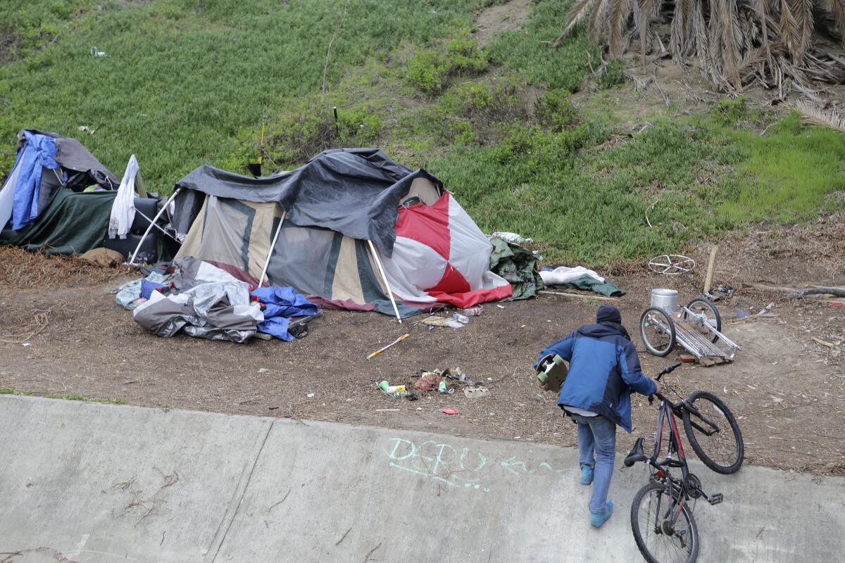 A  homeless camp on the east side of I-5 just south of the Oceanside Boulevard.