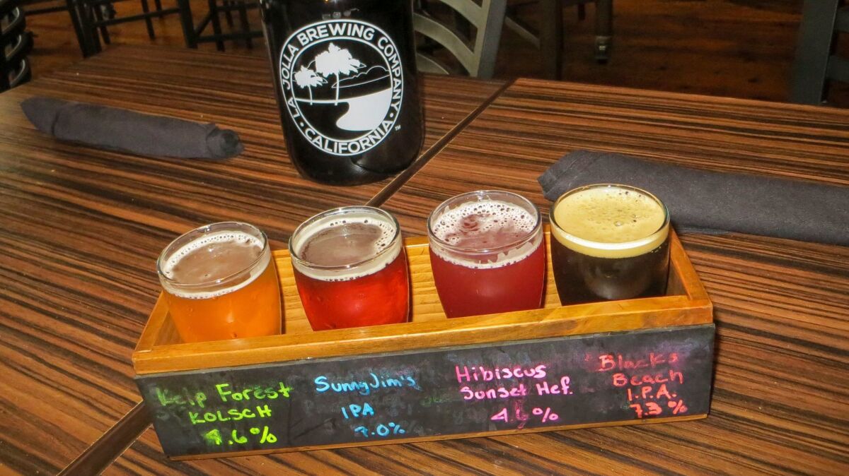 Tasters at La Jolla Brewing Co., which also serves food, wine and mixed drinks. (Irene Lechowitzky)