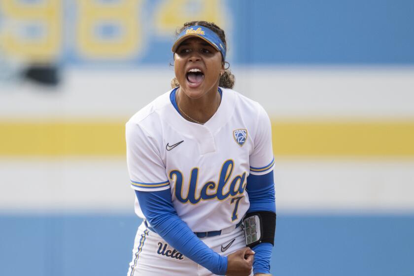UCLA shortstop Maya Brady (7) reacts during an NCAA softball game against Washington on Friday, March 17, 2023, in Los Angeles. (AP Photo/Kyusung Gong)