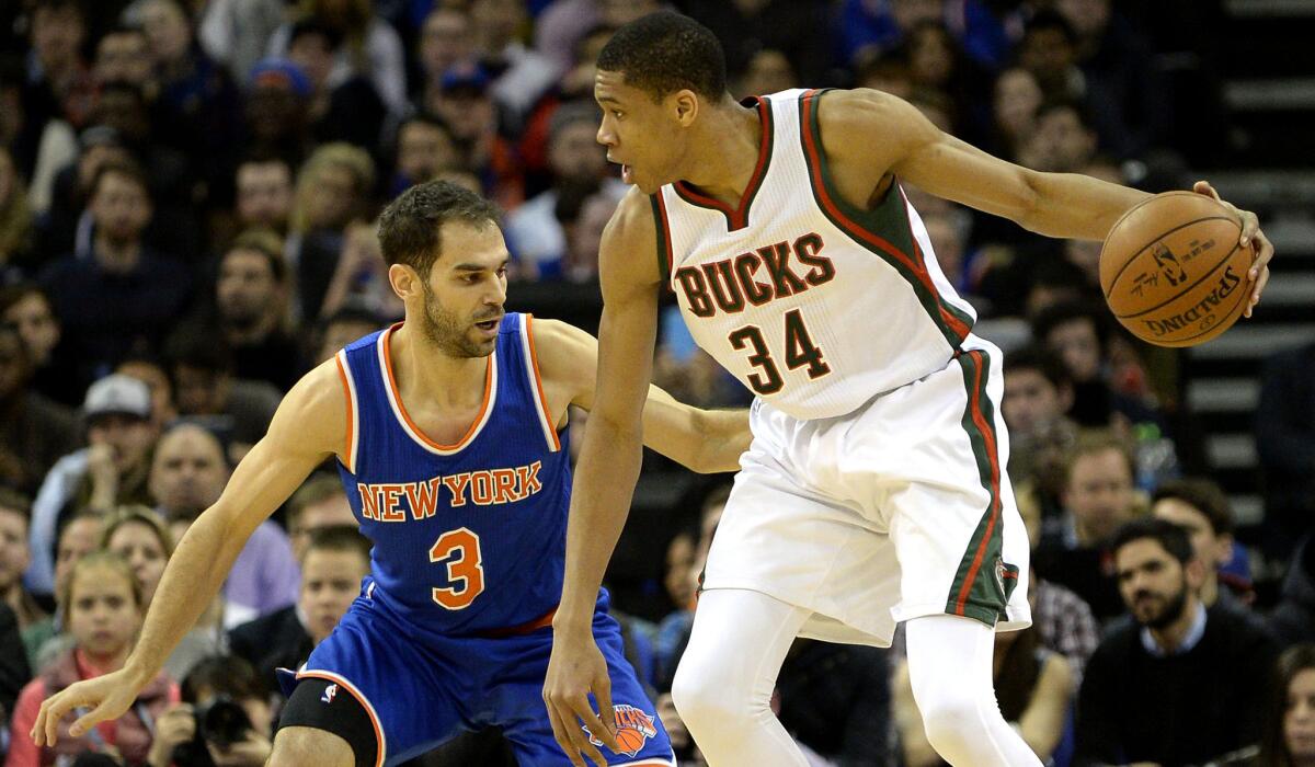 Bucks forward Giannis Antetokounmpo looks to drive against Knicks guard Jose Calderon in a matchup of international players in an NBA game in London on Thursday.