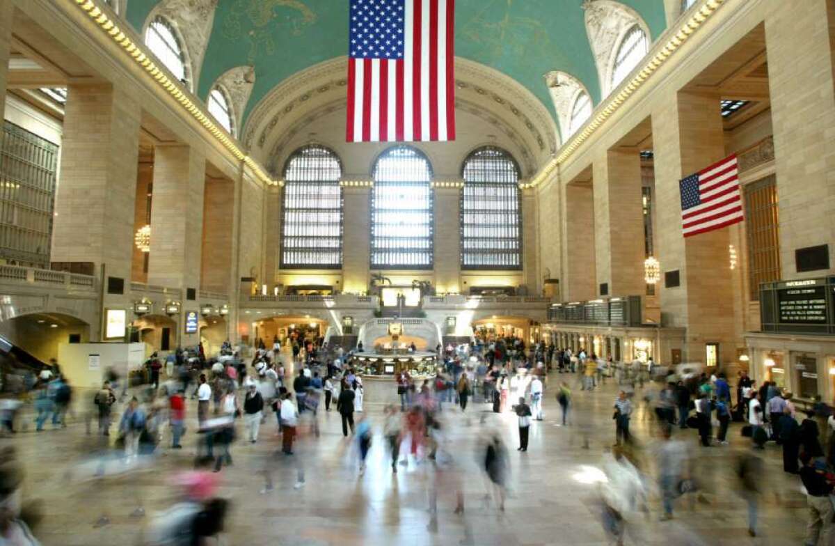 Three men were stabbed in a dispute on a train platform at New York City's Grand Central station on Saturday. One of the victims was listed in critical condition.