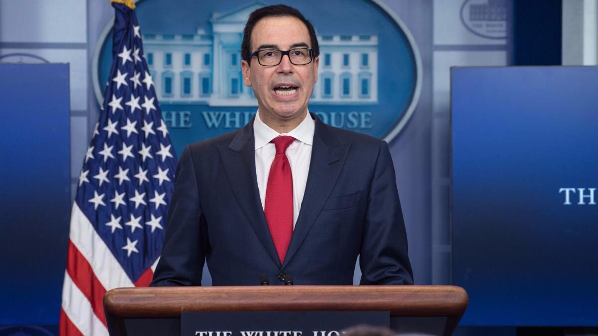 Treasury Secretary Steven T. Mnuchin speaks during a news briefing at the White House on Thursday.
