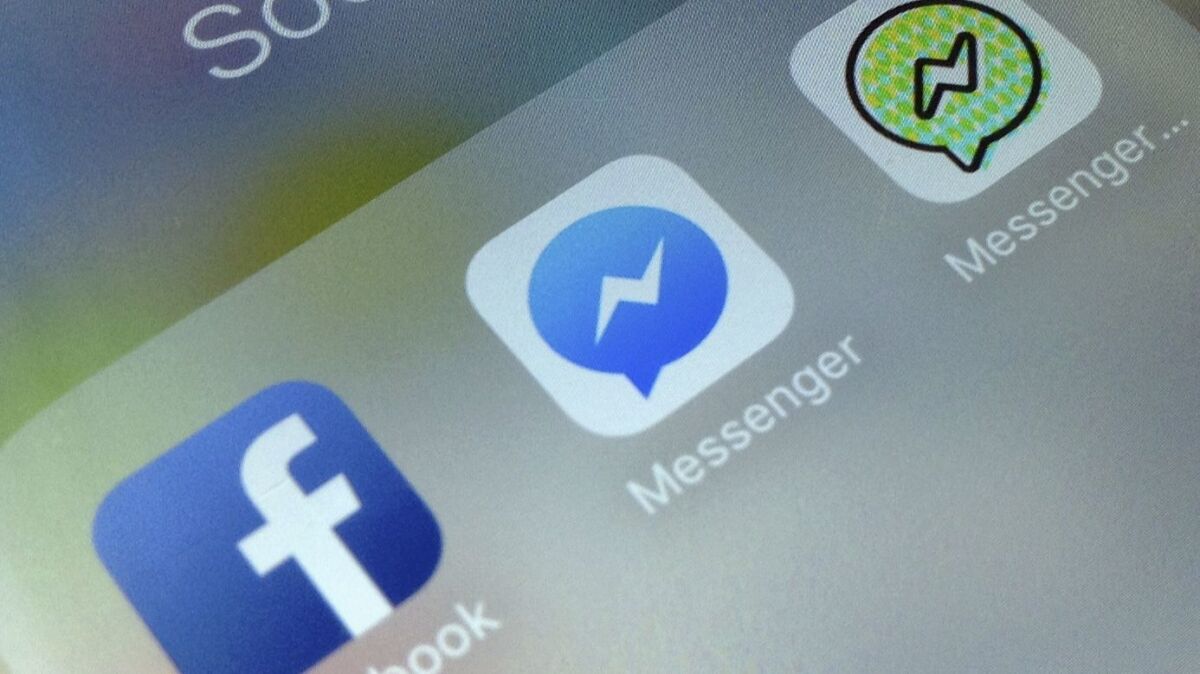 Icons for Facebook and its Messenger and Messenger Kids apps are shown on an iPhone.