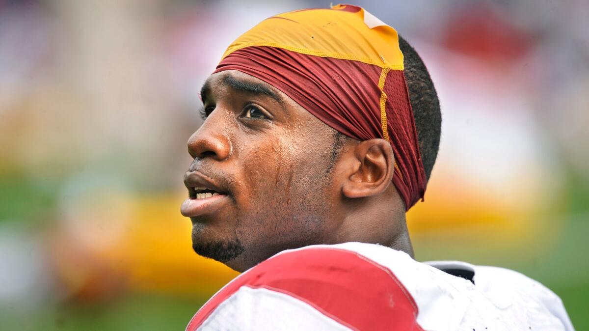 Joe McKnight prepares for a game with the Trojans in 2009.