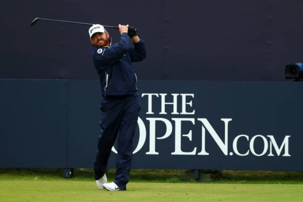 J.B. Holmes hits from the first tee during the final round of the British Open on Sunday.