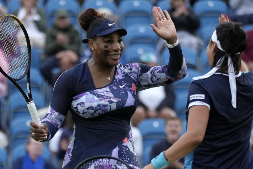 Serena Williams of the United States, left, and Ons Jabeur of Tunisia celebrate.