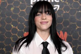 Billie Eilish poses at the premiere of the Amazon Prime Video series "Swarm,"Tuesday, March 14, 2023, at Lighthouse ArtSpace in Los Angeles. (AP Photo/Chris Pizzello)
