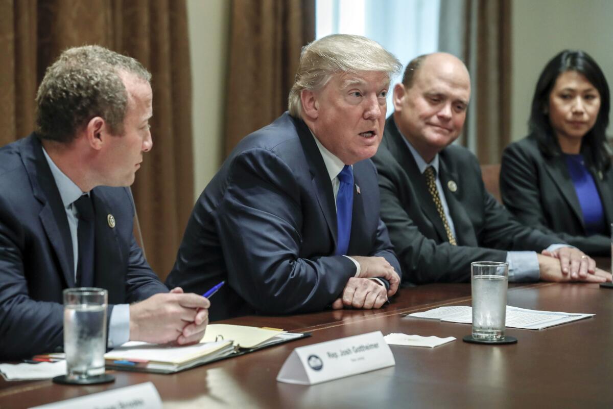 President Trump meets at the White House with a bipartisan group of lawmakers about tax reform.