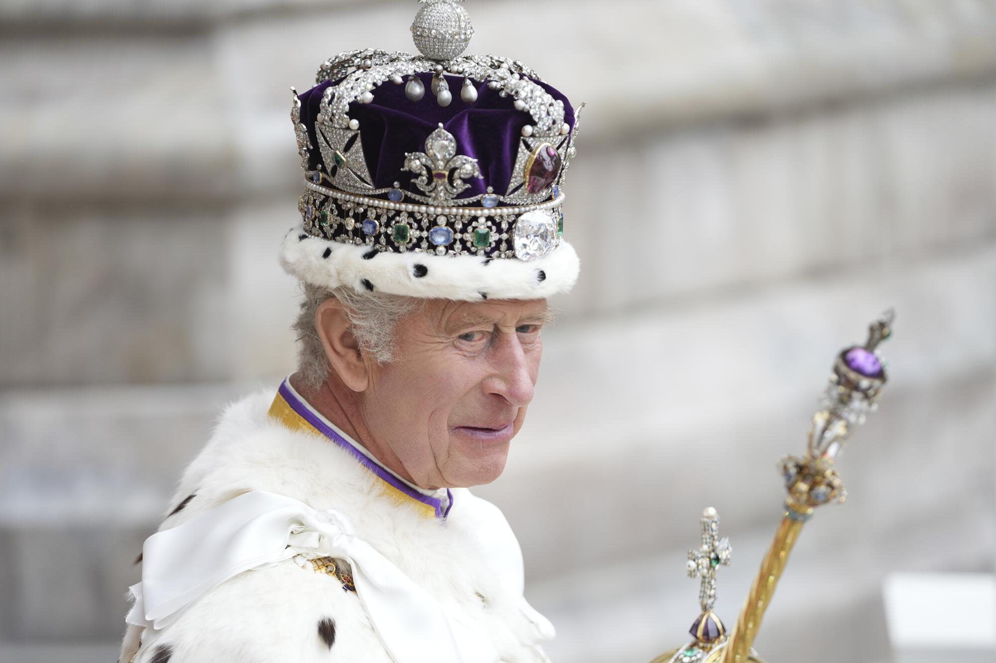 The King leaves Westminster Abbey after the coronation of King Charles III in London.