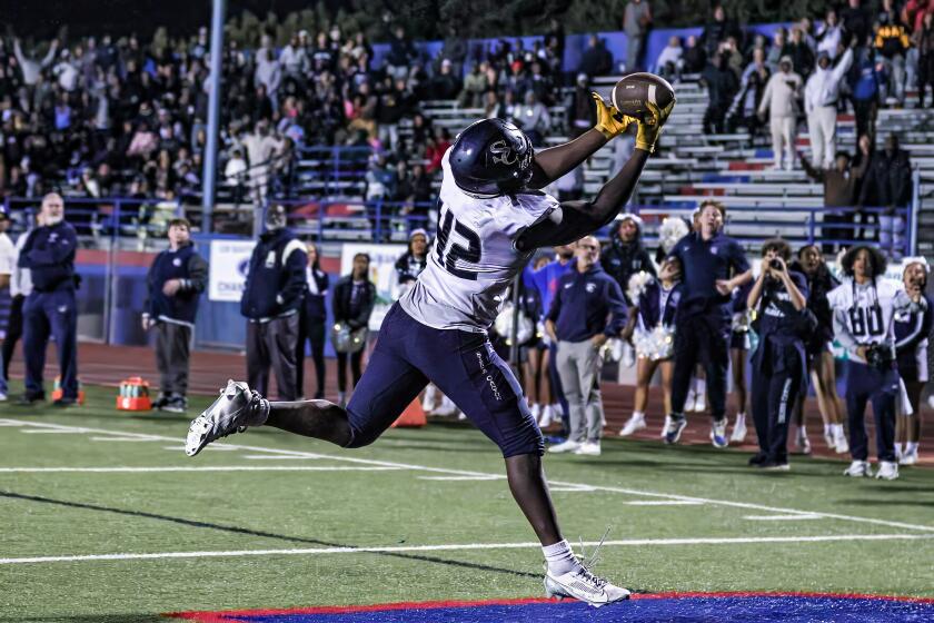 Defensive tackle Mikhal Johnson of Sierra Canyon makes his first ever reception for touchdown on tackle eligible play.