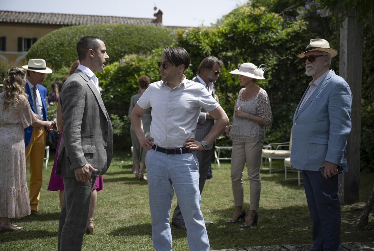 A scene from "Succession" in which the cast is seen on the grounds of a Tuscan villa.