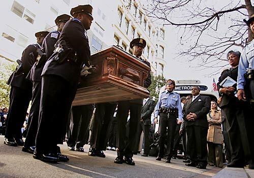 Rosa Parks' casket is carried into Metropolitan AME Church in Washington D.C., where she was honored for her contribution to the civil rights movement.