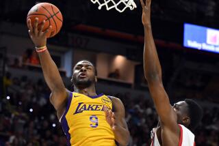 Lakers guard Bronny James shoots against Houston Rockets guard Reece Beekman 