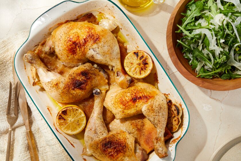 LOS ANGELES CA, SEPT. 24, 2021: Roasted Chicken Legs with Fennel and Arugula Salad photographed for the Los Angeles Times food column on Friday Sept. 24, 2021 at Proplink Studios in Arts District Los Angeles. Prop Styling by Kate Parisan.