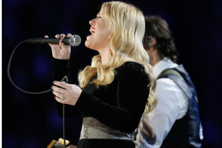 Singer Kelly Clarkson, performing at the 2013 Grammy Awards, may not get to take possession of the Jane Austen ring she bought at auction last year.