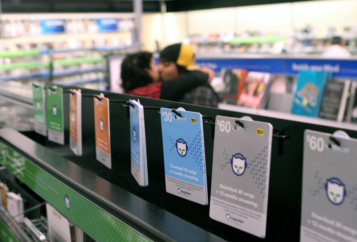 Napster gift cards on display. The investigation into a Calabasas accident, in which a former Napster executive was fatally hit by an Los Angeles County sheriff's patrol car while riding a bike, continues more than a month later.