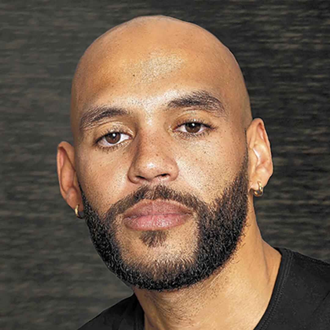 Justin Riley - Los Angeles Times