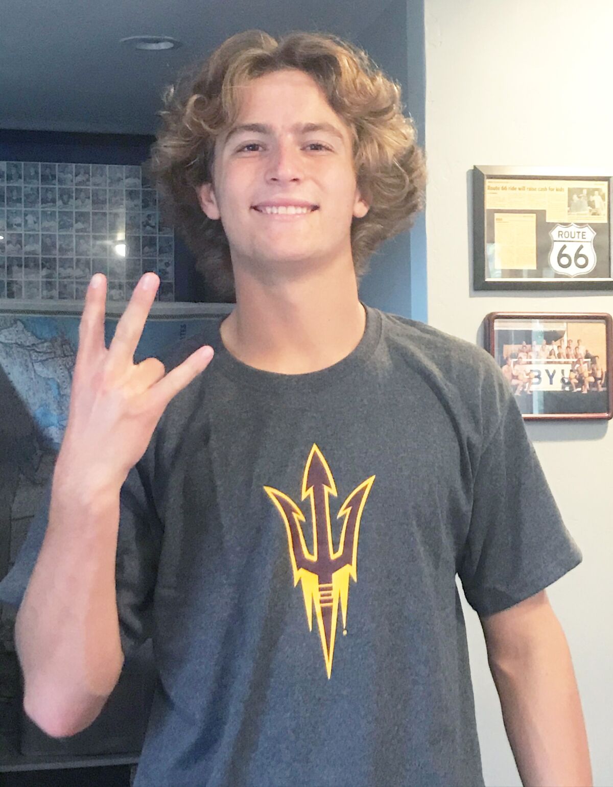 Poway High’s Ryan Kroepel flashing the Arizona State University Sun Devil’s “Fork ‘Em Devils” hand sign.