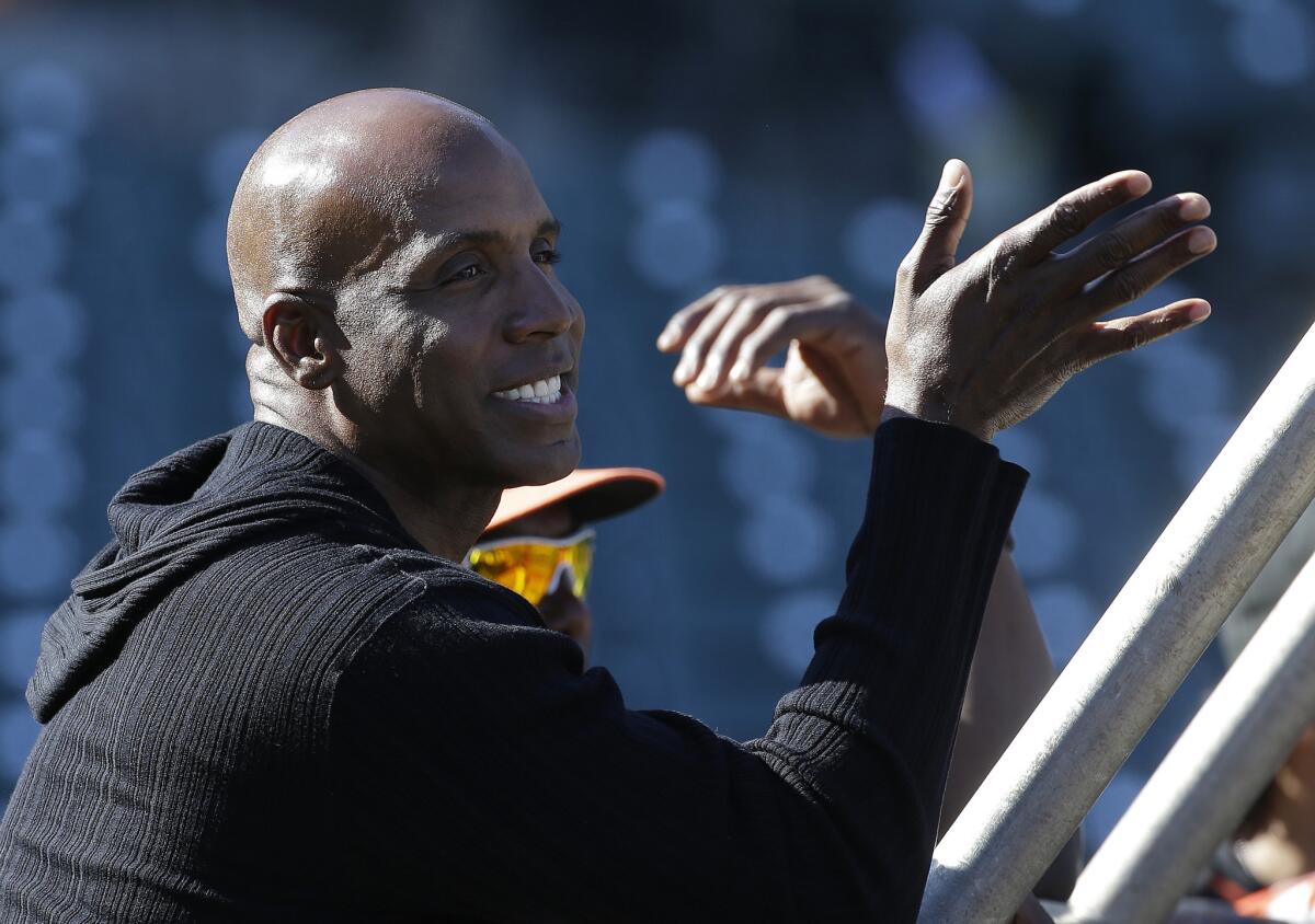 Barry Bonds watches batting practice before the San Francisco Giants play the Philadelphia Phillies on July 10.