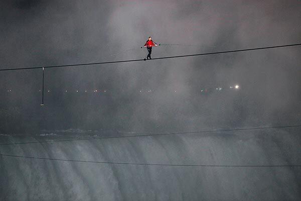 Nik Wallenda on his historic walk. The high-wire artist covered about 1,800 feet at a height of about 180 feet.