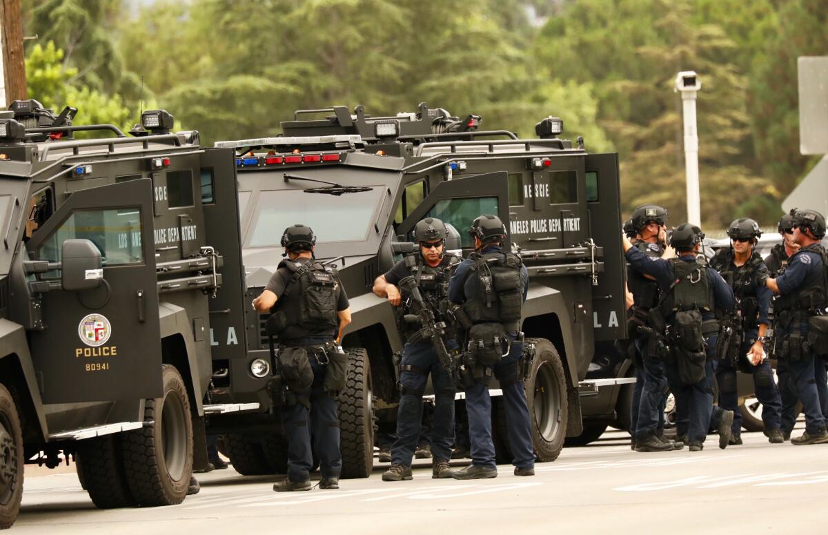 LAPD SWAT officers muster during an operation in Van Nuys in 2019.